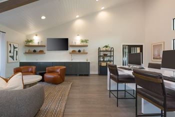 Newly renovated modern clubhouse with social seating and large flat screen